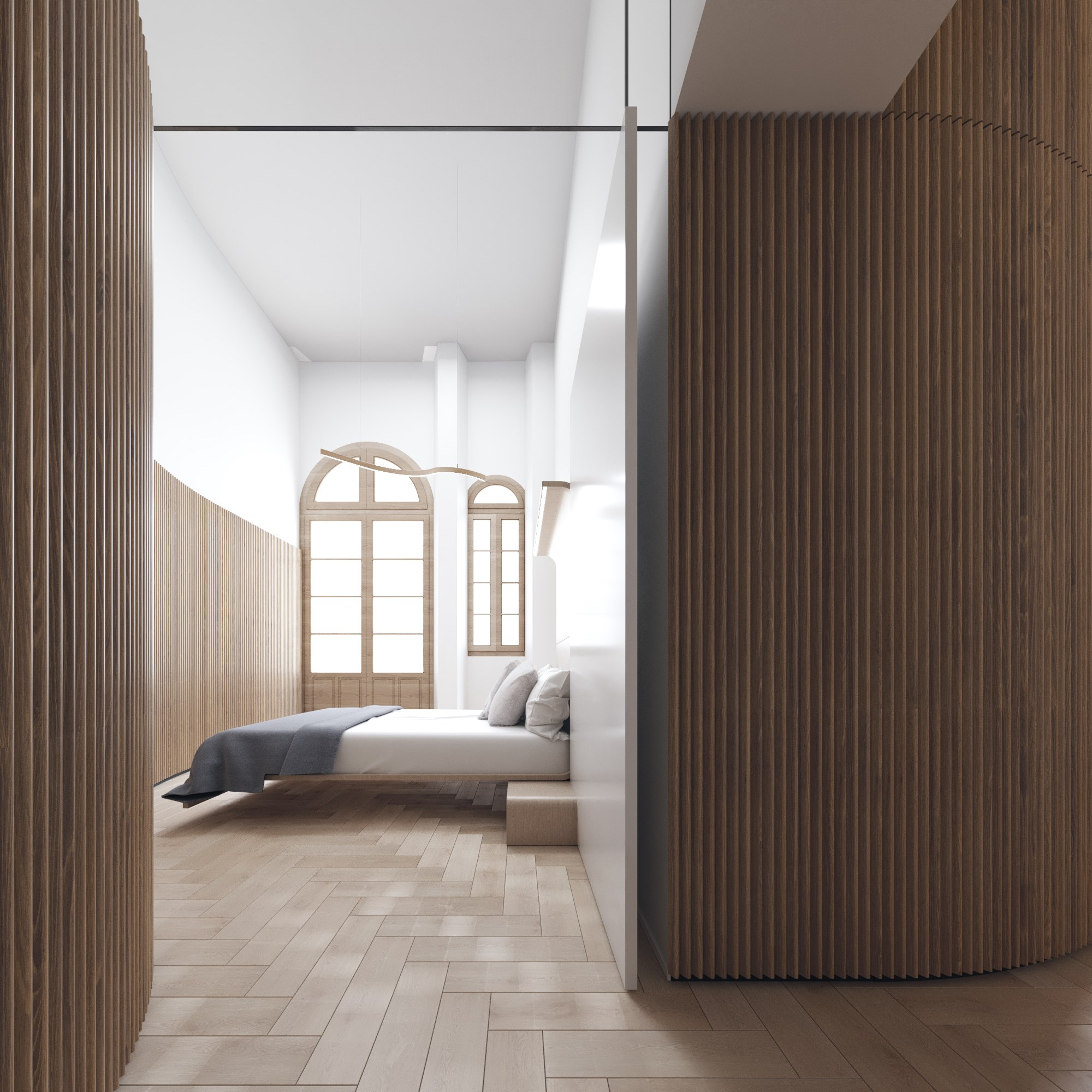 Dormitorio con ventanas arqueadas originales y suelo de espiga