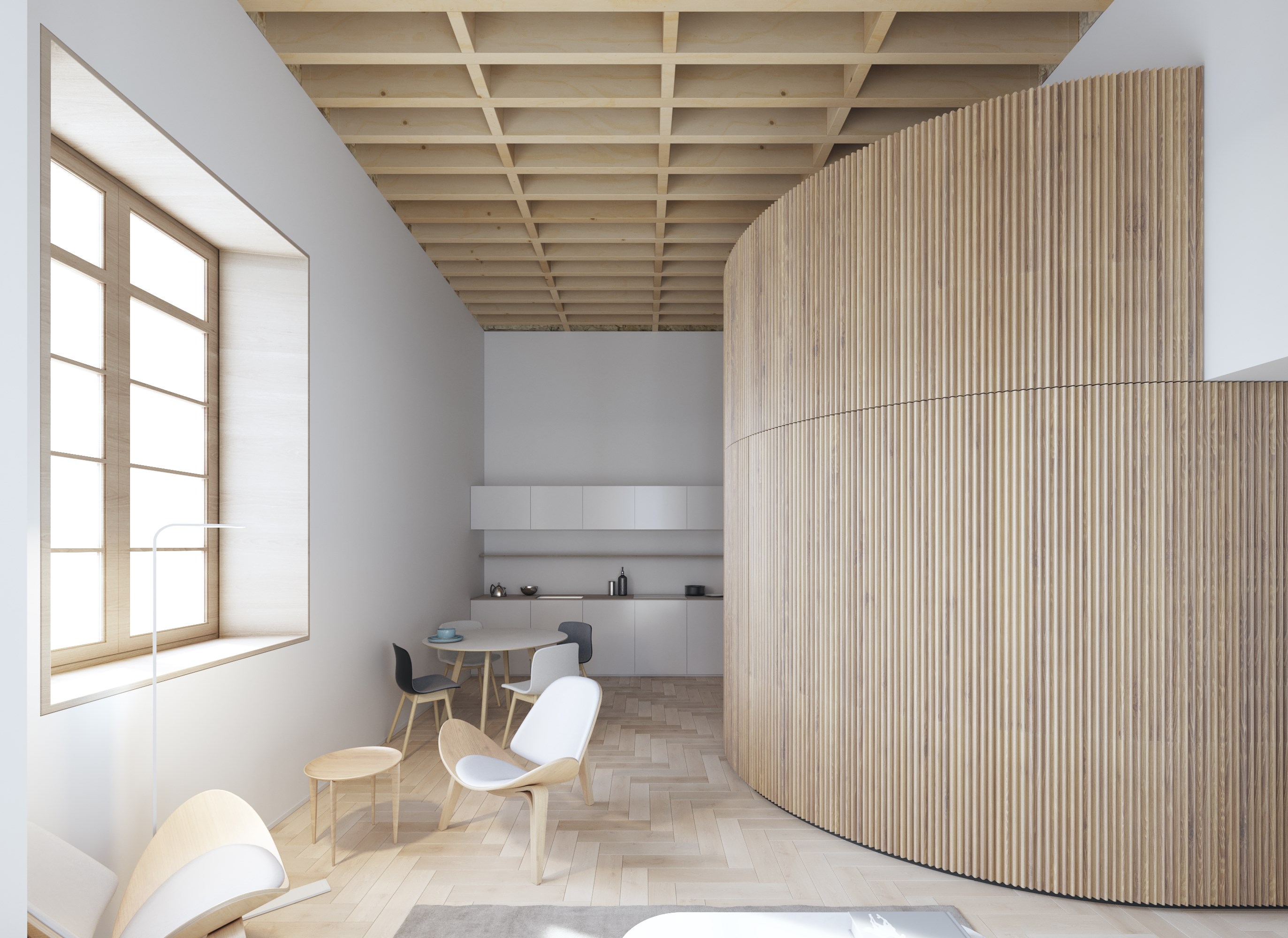 Cocina abierta con pared curva de listones de madera